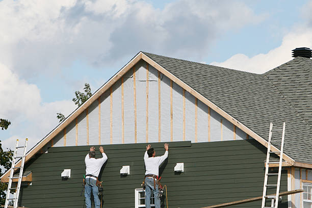 Professional Siding Replacement technician working in Wyano, PA